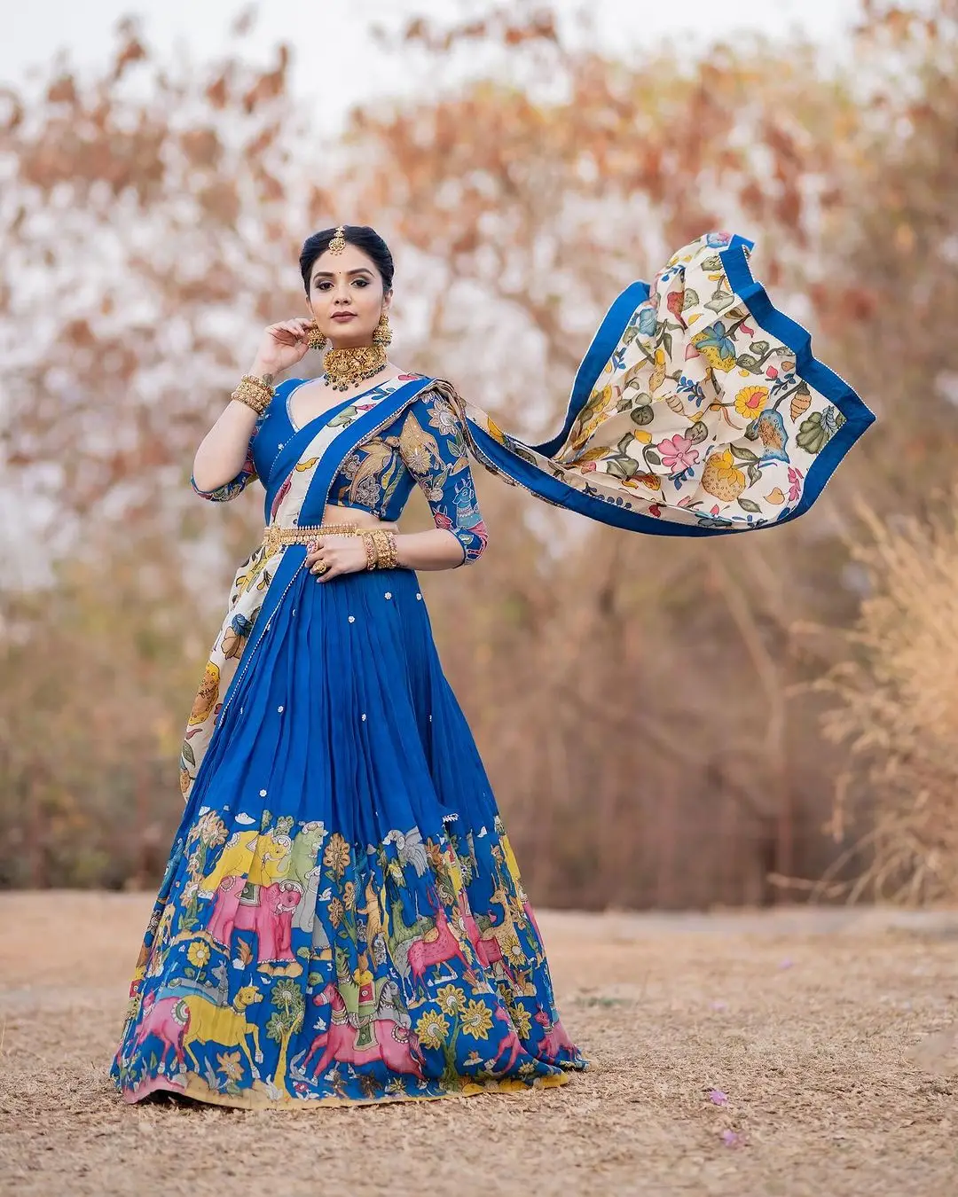 Indian TV Actress Sreemukhi Pics in Blue Lehenga Choli